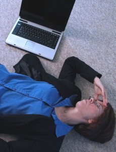 stressed out lady with a laptop