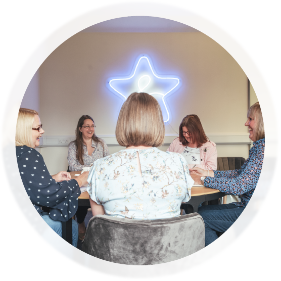 image of staff in a team meeting
