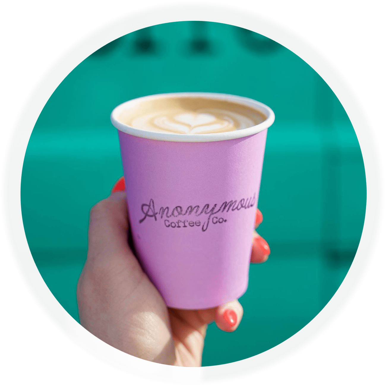 Pink paper coffee branded by Anonymous Coffee
